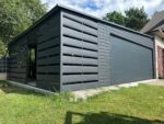 Garaż blaszany z bramą segmentową 6 m + 1,5m x 5,5 m ID 109